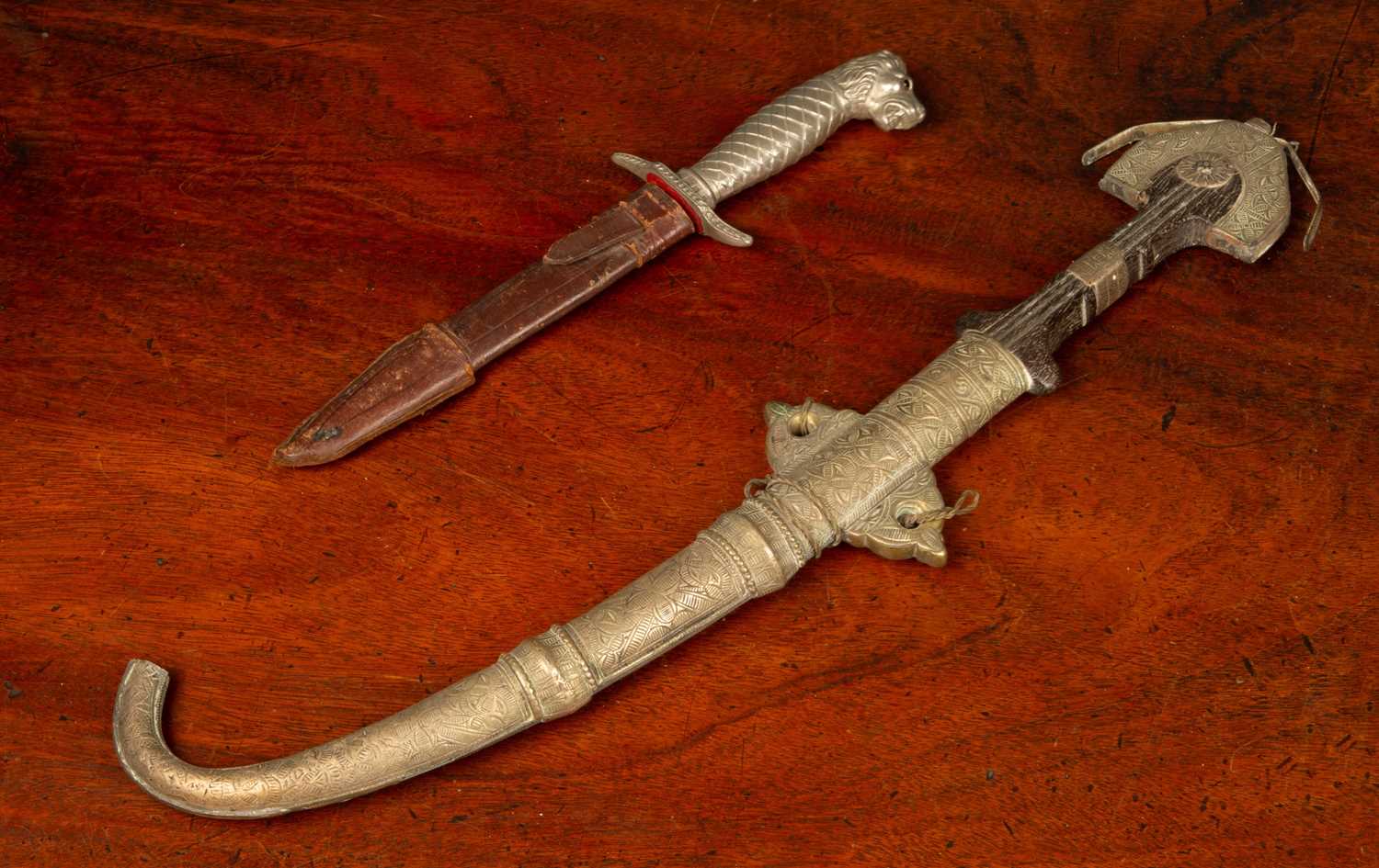 Lot 322 - A middle eastern dagger and a further dagger...