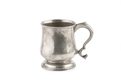 Lot 518 - A George II Scottish silver mug, of baluster...