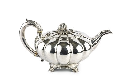 Lot 510 - A mid Victorian silver melon shaped teapot,...