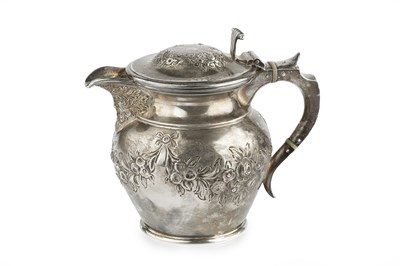 Lot 541 - A George V Scottish silver hot milk jug, the...