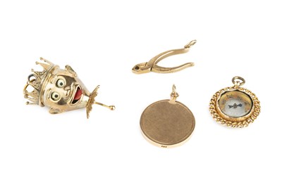 Lot 243 - A collection of novelty pendants, comprising a...