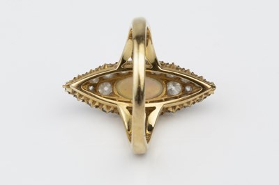 Lot 121 - An opal and diamond panel ring, the...