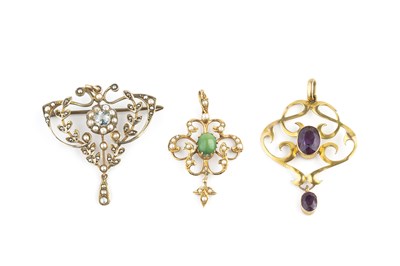 Lot 108 - Three gem set pendants, comprising an early...