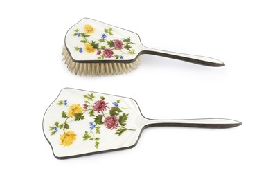 Lot 365 - A silver and enamel backed hand mirror and...