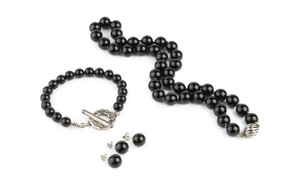 Lot 154 - An onyx bead necklace, bracelet and ear studs...