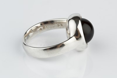 Lot 151 - A silver and onyx 'Sphere' bangle and ring...