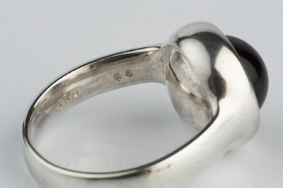 Lot 151 - A silver and onyx 'Sphere' bangle and ring...