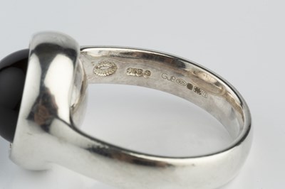 Lot 151 - A silver and onyx 'Sphere' bangle and ring...