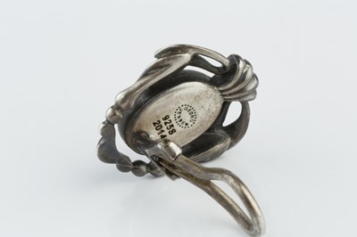 Lot 157 - A 'Moonlight Blossom' dress ring by Georg...