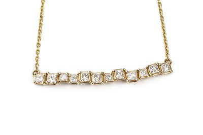 Lot 130 - A diamond pendant necklace, designed as a line...