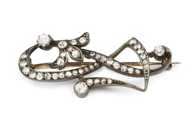 Lot 175 - A diamond panel brooch, of sinuous openwork...