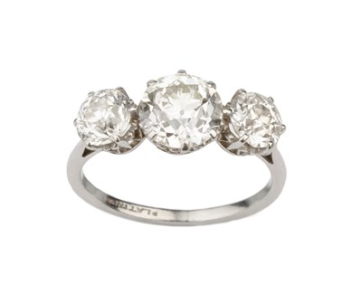 Lot 192 - A diamond three stone ring, the graduated old...