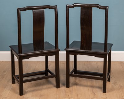 Lot 583 - A pair of 18th or 19th century Chinese zitan and rosewood yoke back chairs