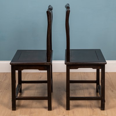 Lot 583 - A pair of 18th or 19th century Chinese zitan and rosewood yoke back chairs