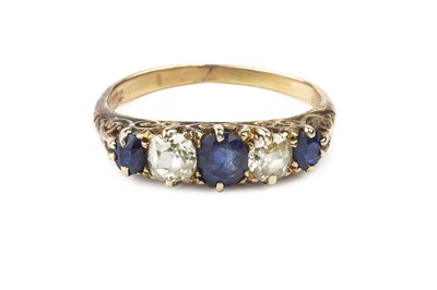 Lot 135 - A sapphire and diamond five stone ring, the...