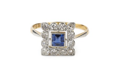 Lot 131 - A sapphire and diamond panel ring, the pierced...