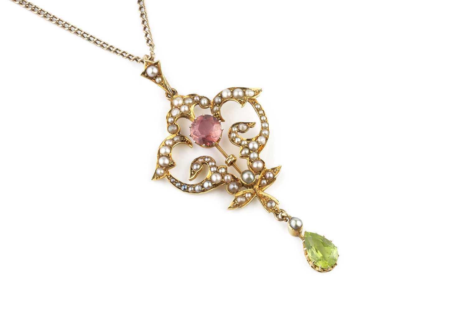Lot 25 - An early 20th century half pearl and gem set...