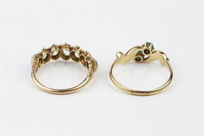Lot 28 - A 19th century chrysoberyl half hoop ring, the...