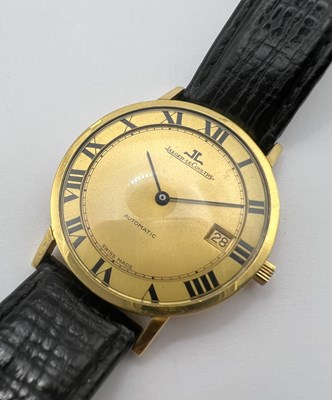 Lot 213 - An 18ct gold automatic wristwatch by...