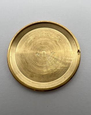 Lot 212 - A wristwatch by Piaget, the circular green...