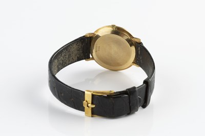 Lot 212 - A wristwatch by Piaget, the circular green...