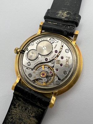 Lot 212 - A wristwatch by Piaget, the circular green...