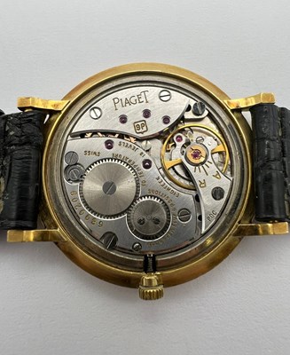 Lot 212 - A wristwatch by Piaget, the circular green...