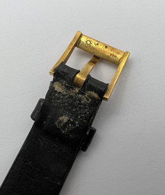 Lot 212 - A wristwatch by Piaget, the circular green...