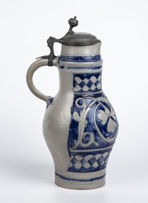 Lot 110 - An 18th century Westerwald stoneware jug with...