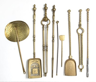 Lot 109 - A set of three Georgian brass fire irons, a...