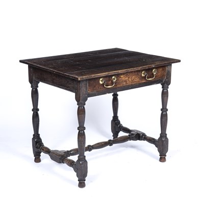 Lot 50 - An 18th century oak side table with a single...