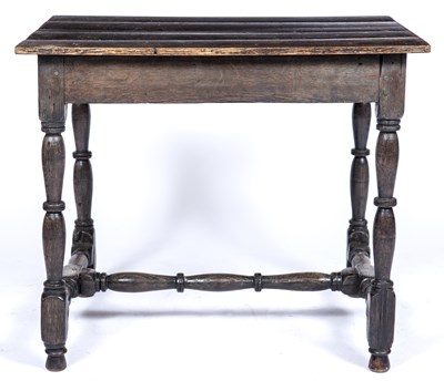 Lot 50 - An 18th century oak side table with a single...