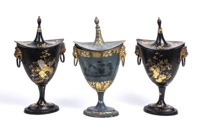 Lot 74 - A pair of Regency toleware chestnut urns with...