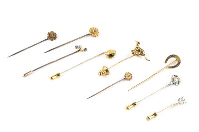 Lot 234 - A collection of stick pins, comprising a...