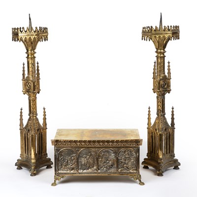 Lot 130 - A pair of ecclesiastical gilt metal candle...