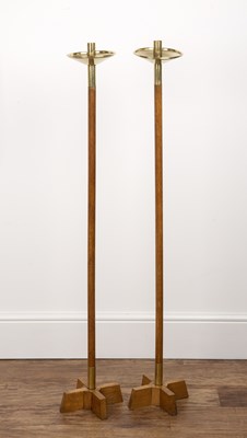 Lot 39 - A pair of oak and brass tall floor standing...