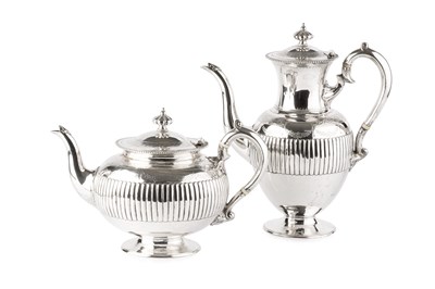 Lot 577 - A late Victorian silver coffee pot and...