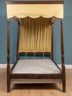 Lot 374 - An antique mahogany four poster bed