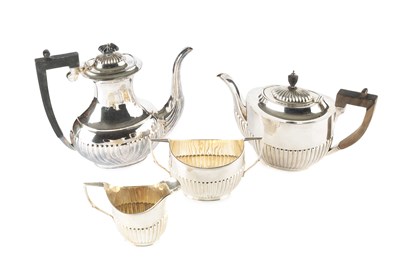 Lot 581 - A George V silver three-piece tea service, of...