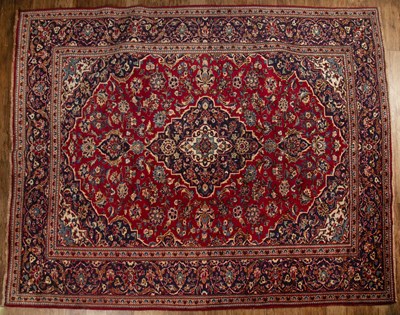 Lot 118 - Ardekan red and blue ground wool carpet...