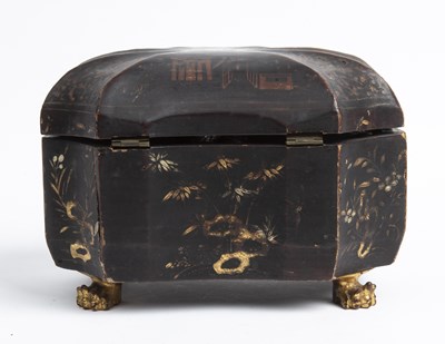 Lot 76 - A George III lacquered tea caddy of shaped...