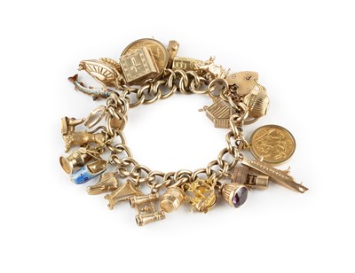 Lot 24 - A charm bracelet, the 9ct gold curb-link...