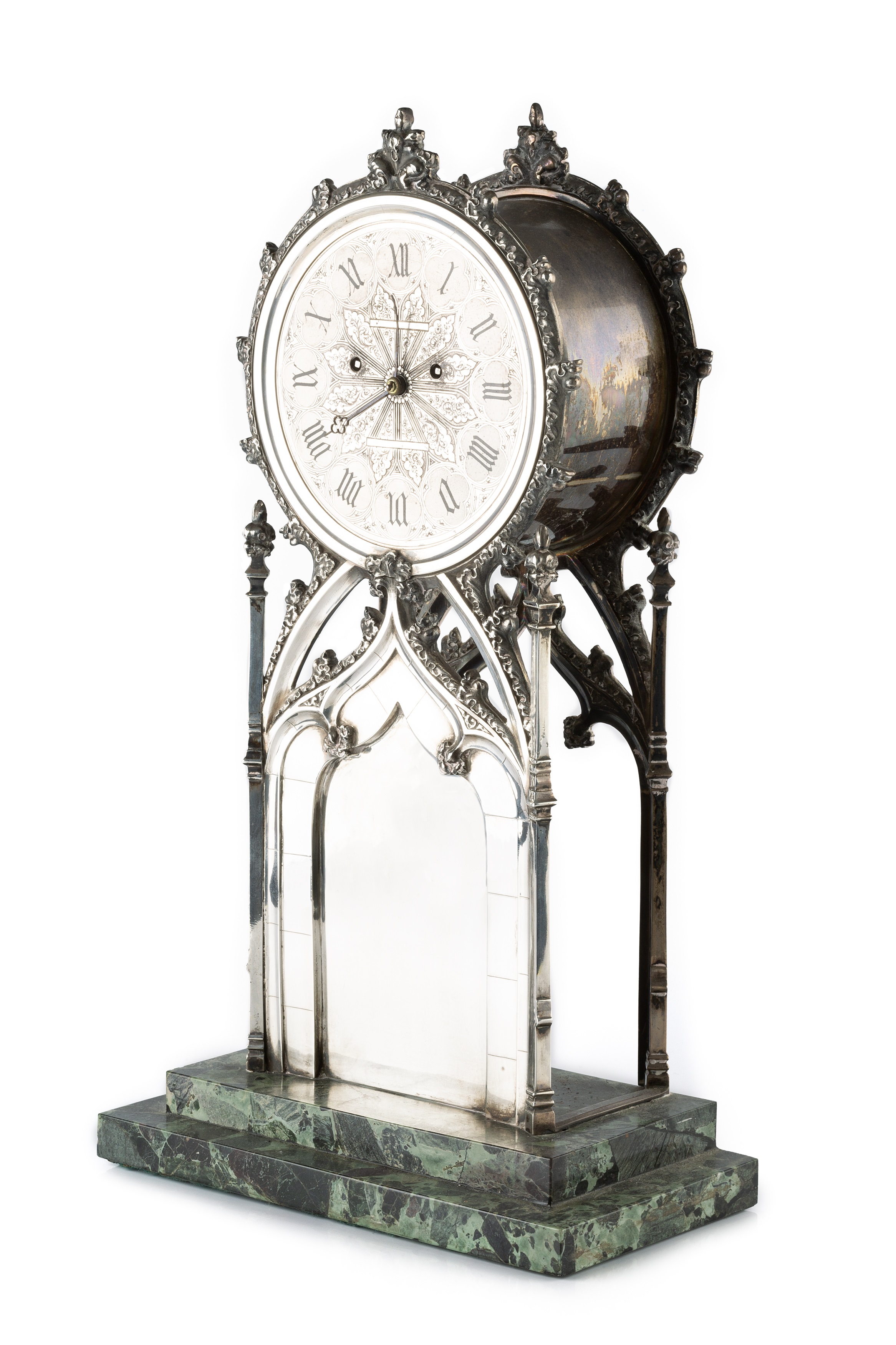 Lot 583 An early Victorian silver mantel clock, the