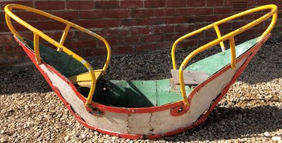 Lot 311 - A vintage painted wood rocking horse and a vintage painted metal rocking boat