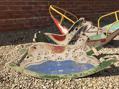 Lot 311 - A vintage painted wood rocking horse and a vintage painted metal rocking boat