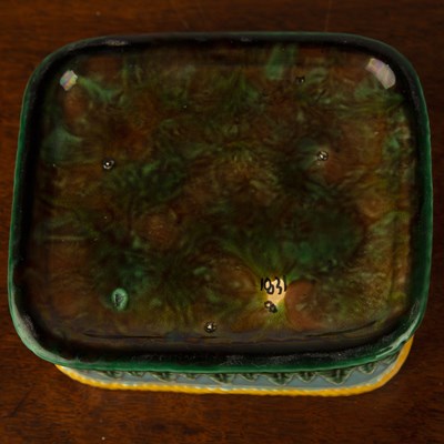 Lot 257 - George Jones majolica sardine box, cover, and...