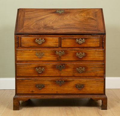 Lot 183 - A George III mahogany bureau the fall front...