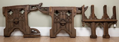 Lot 184 - A walnut gothic style table supports (for...