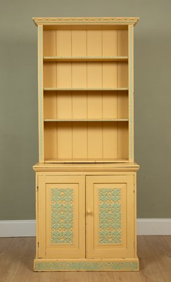 Lot 305 - A painted bookcase cabinet the upper section...