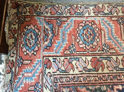 Lot 1047 - A large Persian rug